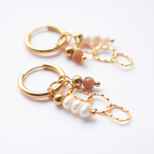 Oorbellen met hangers en parels
