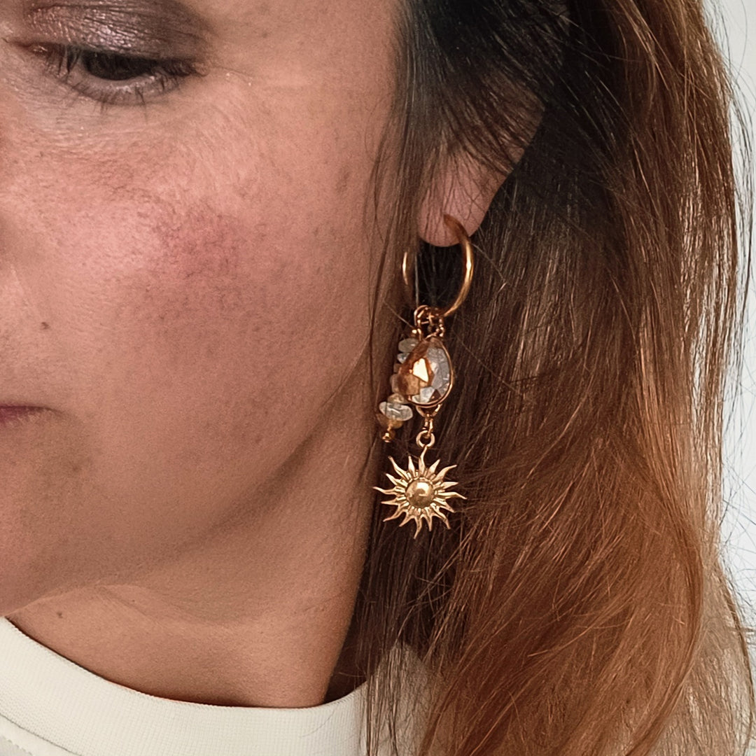 Statement oorbellen zon en edelstenen goud
